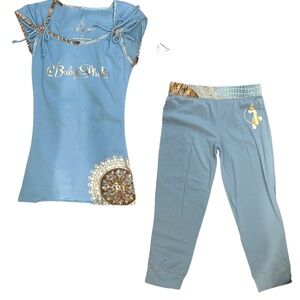Baby Phat light blue shirt and pants set with gold and brown details